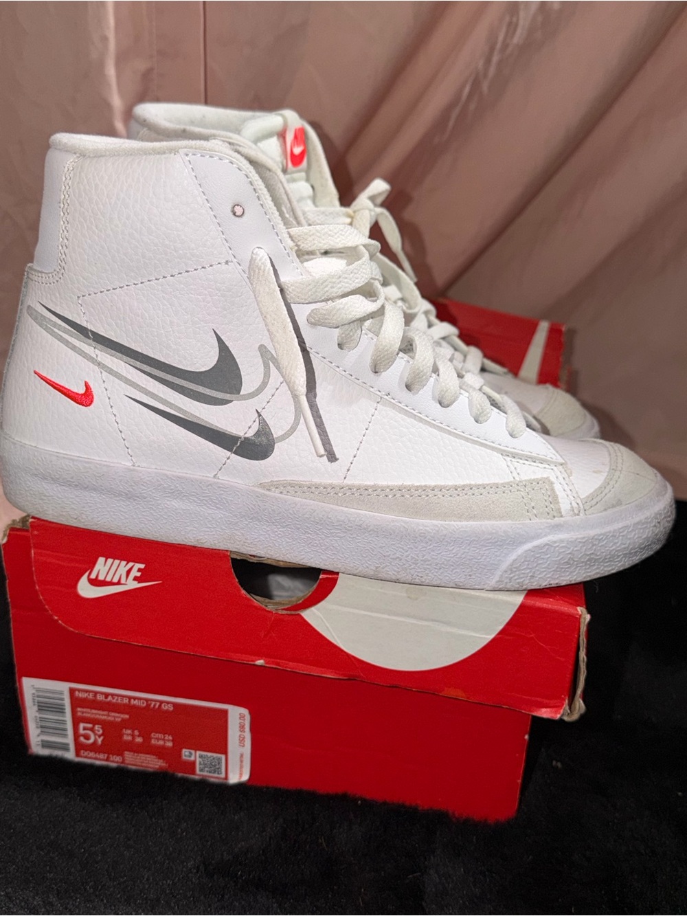 Nike Kids White Sneakers with Red Tongue Label